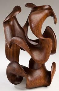 Morph III, finished sculpture in deep walnut by Harry Pollitt