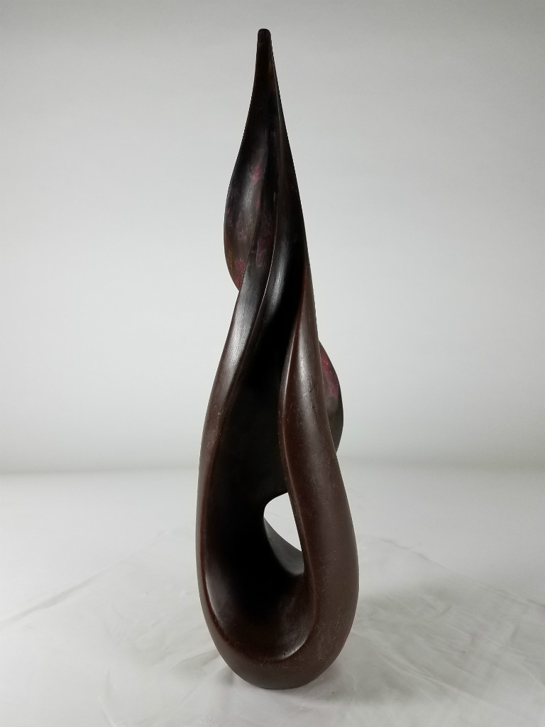 From smooth brown wax sculpture as seen here on its way to foundry's glass kiln process.