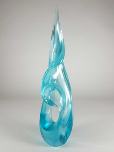 A pale cooper blue glass sculpture joins the Pollitt Small Treasures ensemble.