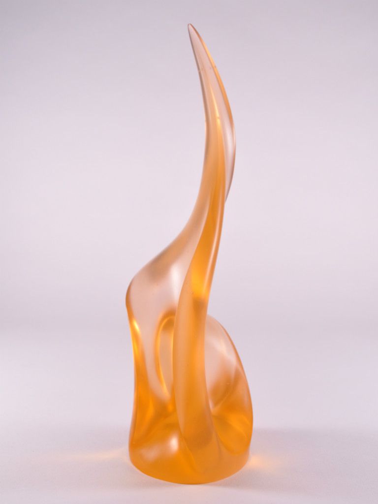 The “mast” of this glass sculpture reaches 1'-2”” high with a luminosity that looks like its wind-blown and backlit by the sun.